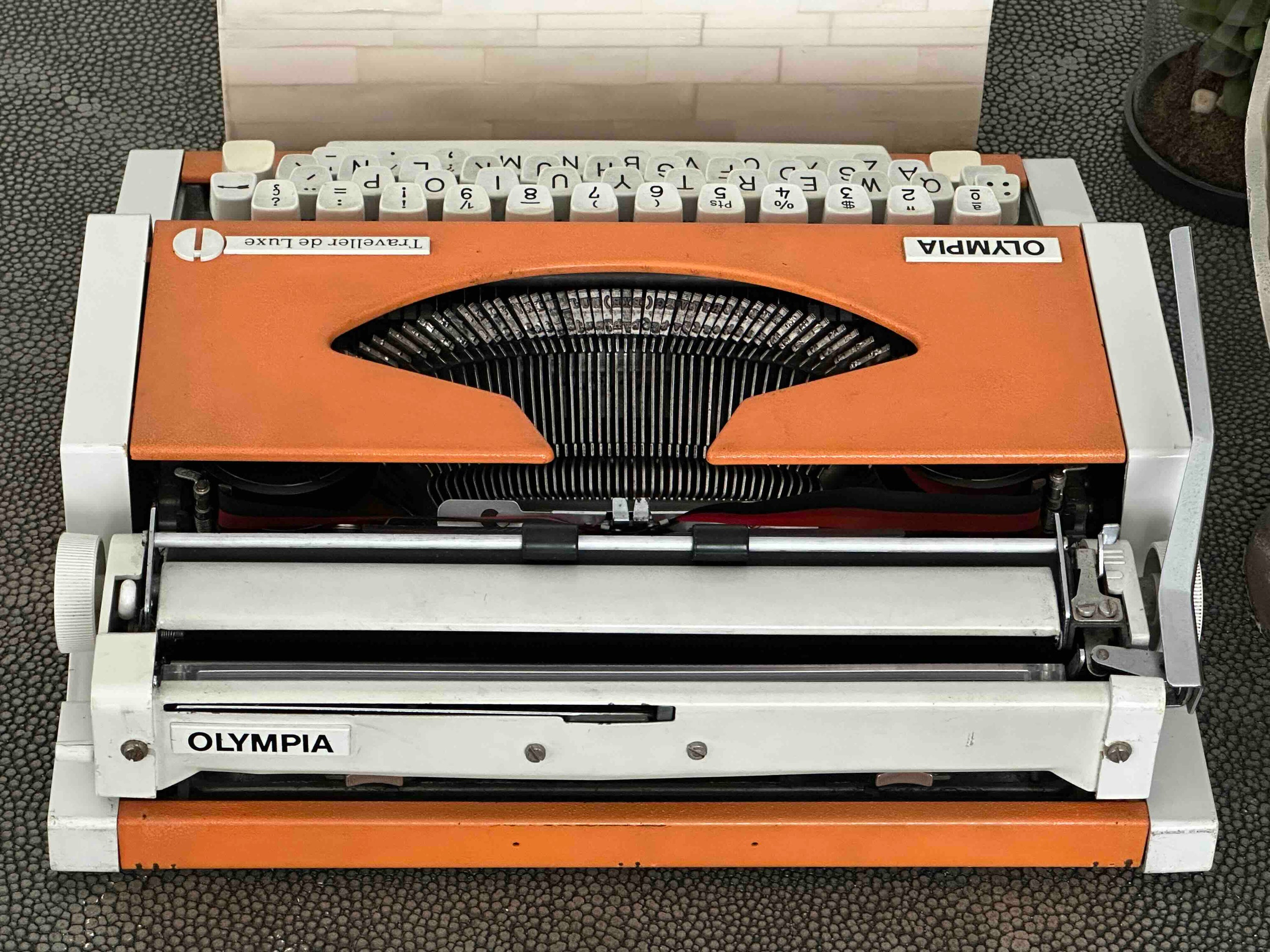 Olympia Traveller de Luxe Typewriter with Qwerty Layout, 1977, Orange, Fully Functional
