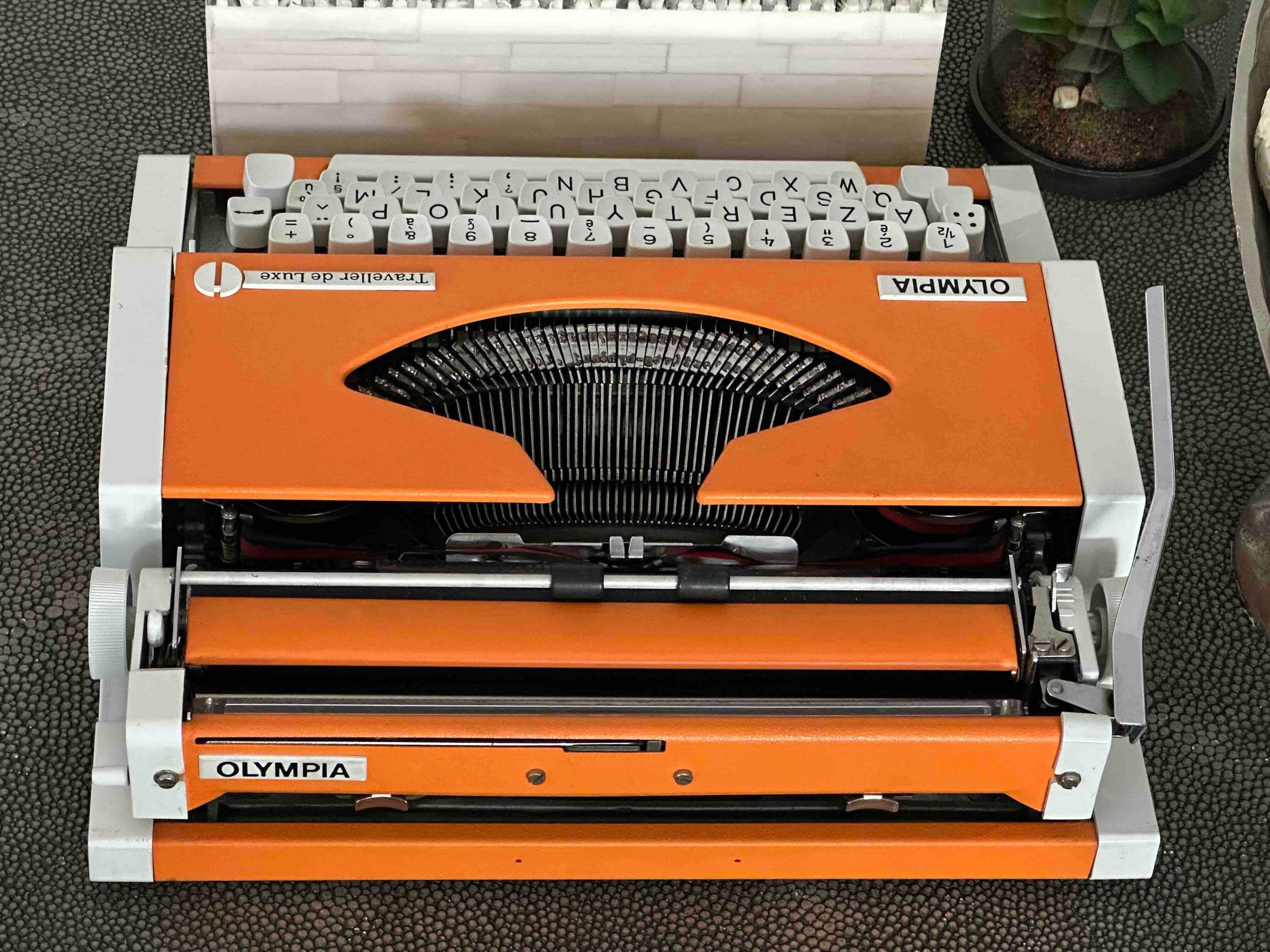 Olympia Traveller de Luxe Typewriter with Azerty Layout, 1977, Orange, Fully Functional