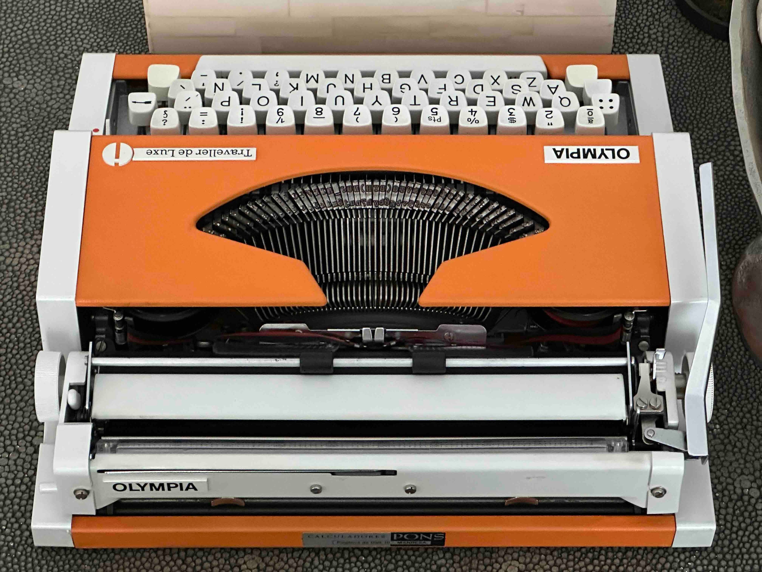 Olympia Traveller de Luxe Typewriter with Qwerty Layout, 1977, Orange, Fully Functional
