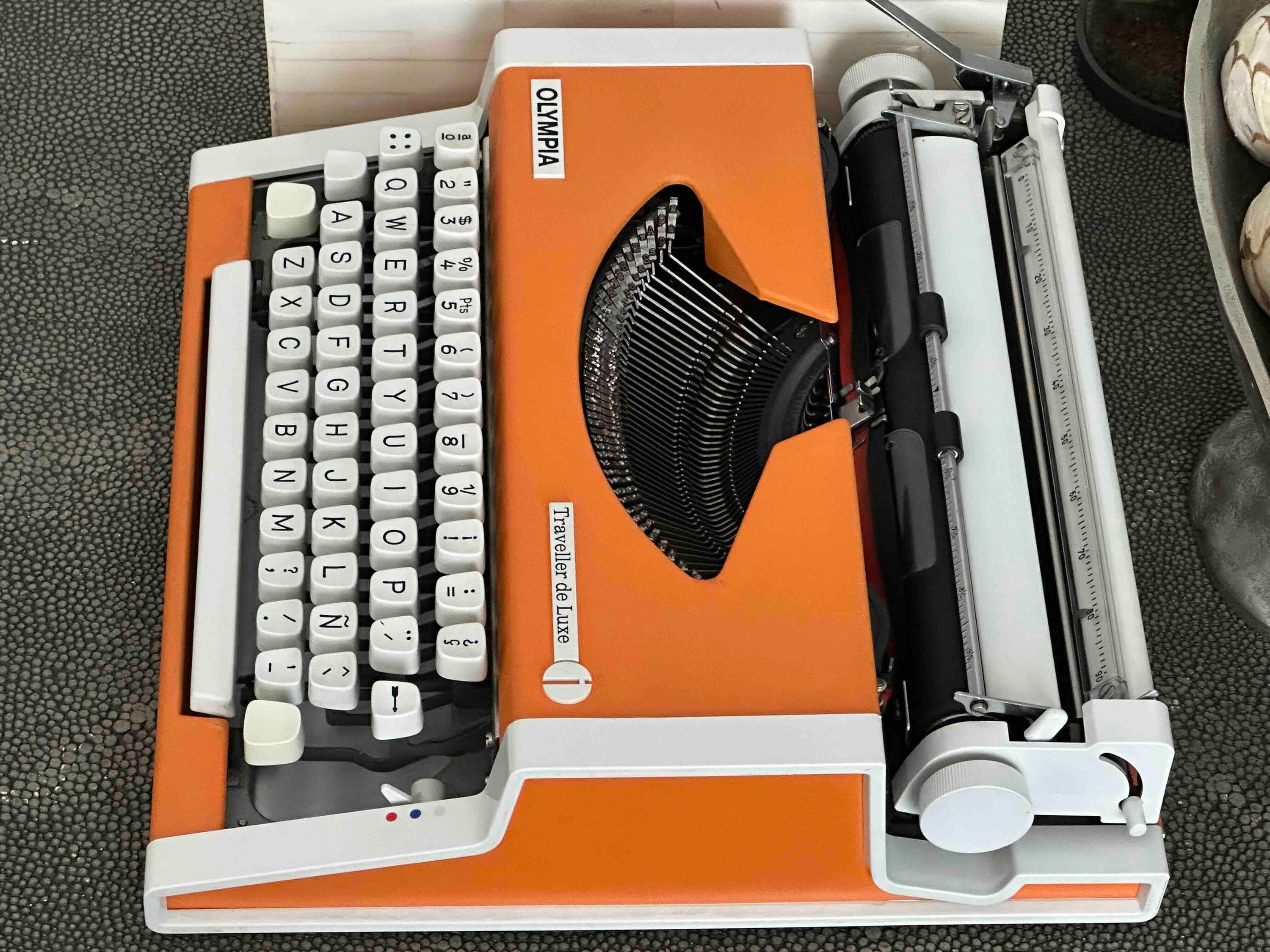 Olympia Traveller de Luxe Typewriter with Qwerty Layout, 1977, Orange, Fully Functional
