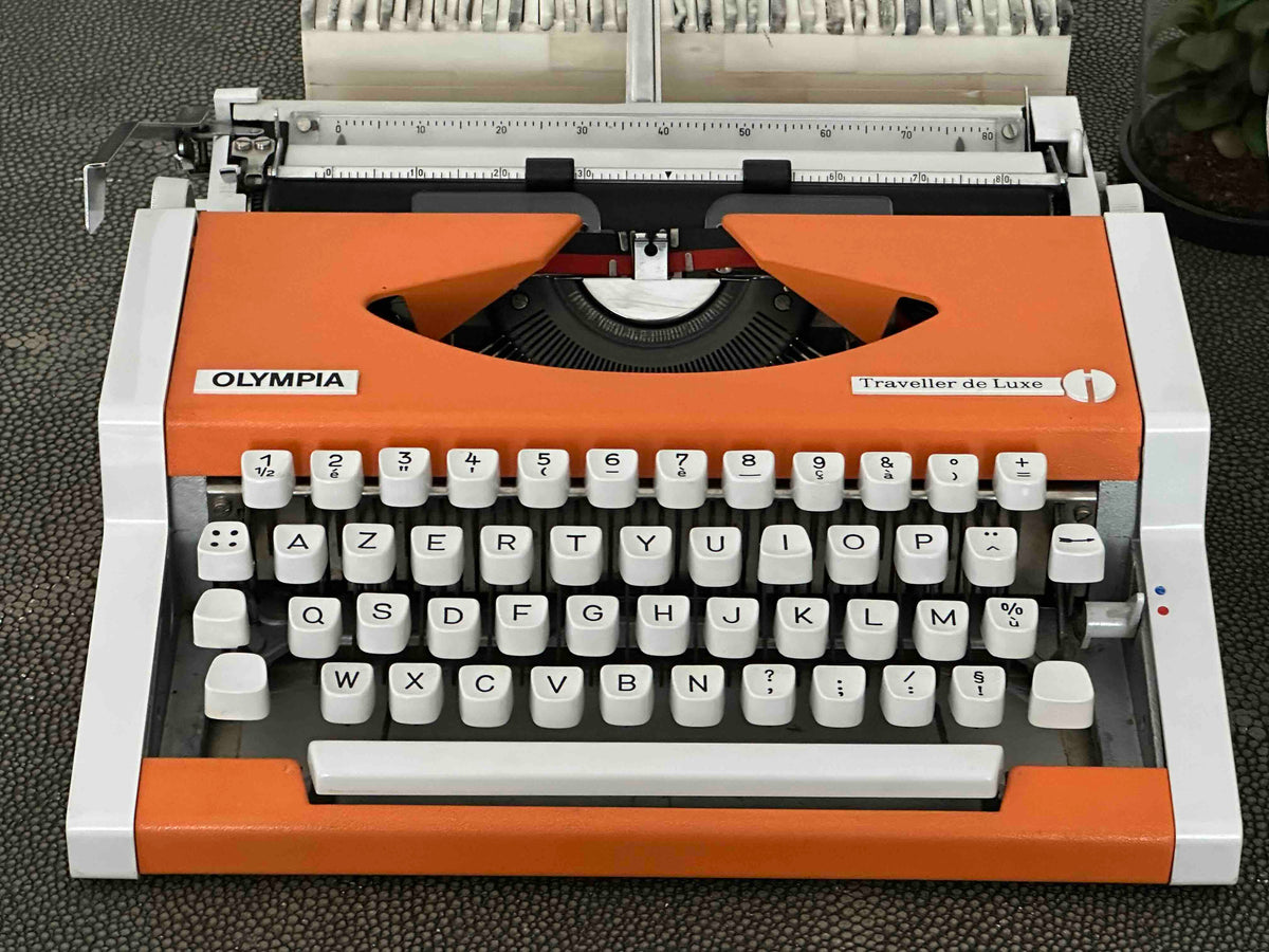 Orange Olympia Traveller de Luxe Typewriter with Azerty Layout, 1977, Fully Working Typewriter