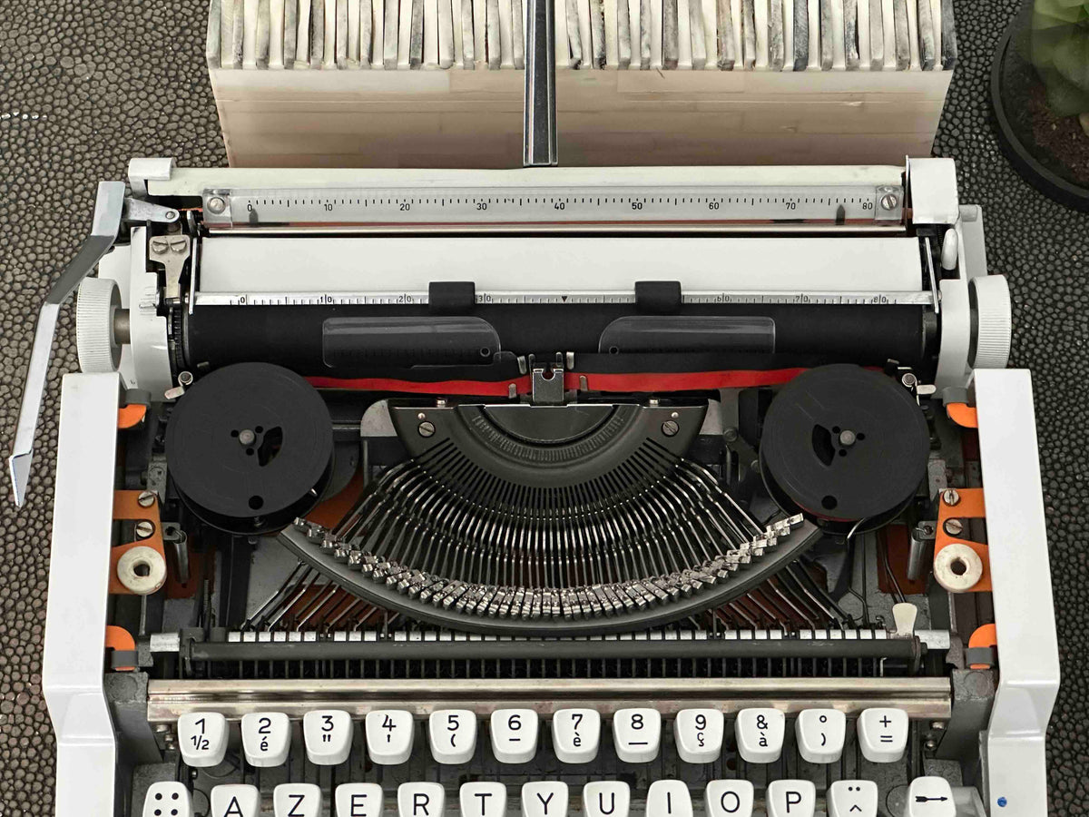 Orange Olympia Traveller de Luxe Typewriter with Azerty Layout, 1977, Fully Working Typewriter