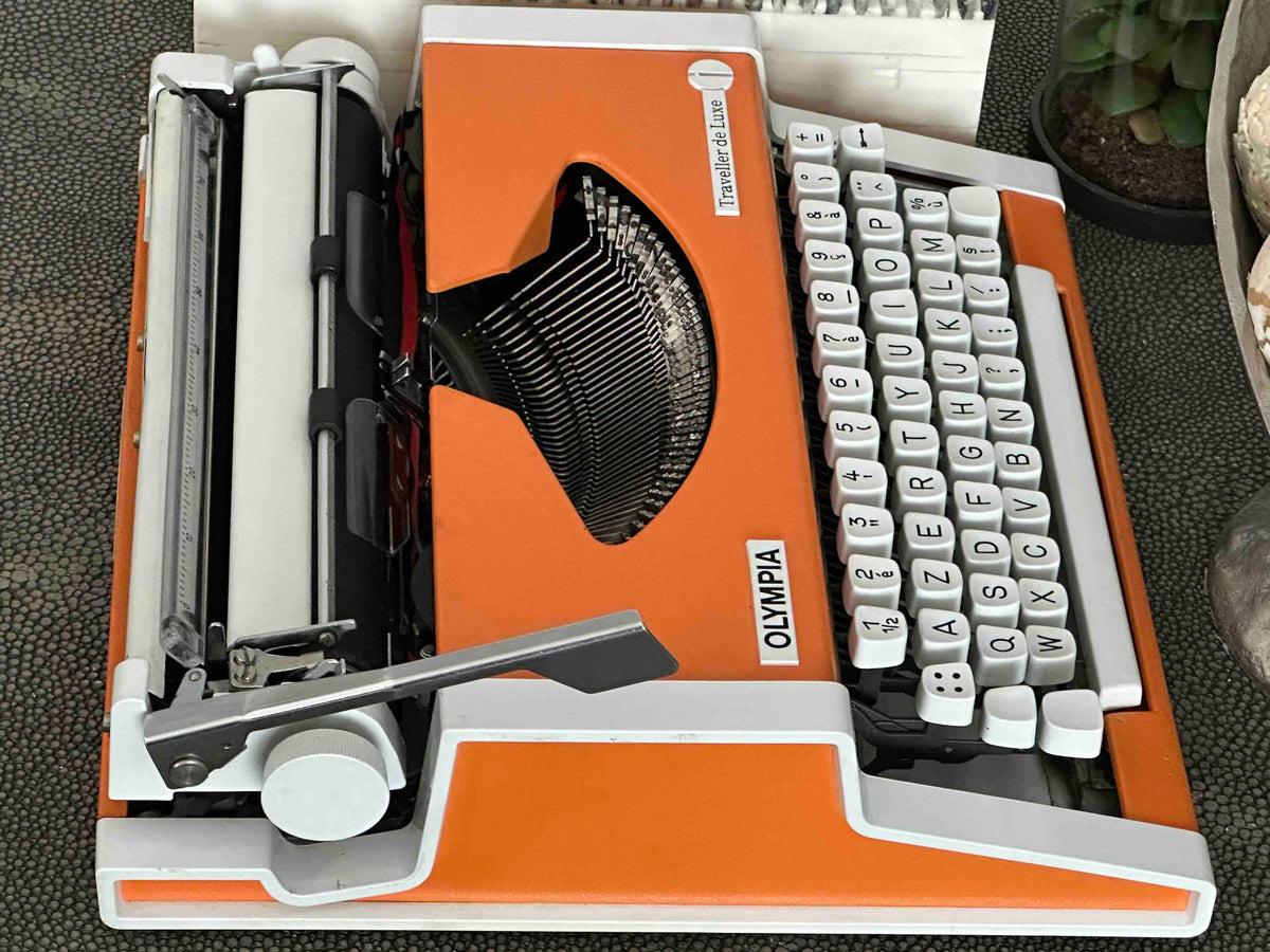 Orange Olympia Traveller de Luxe Typewriter with Azerty Layout, 1977, Fully Working Typewriter