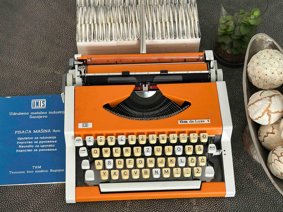 Orange UNIS tbm de Luxe t Typewriter with Qwertz Layout, 1980s, Fully Working Vintage Typewriter